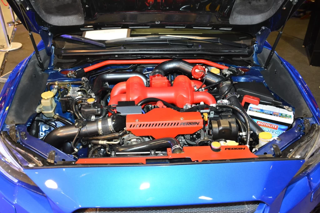 A close-up of customized car engine.