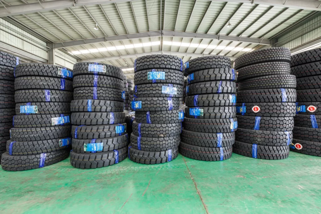 A pile of car tires at a warehouse.