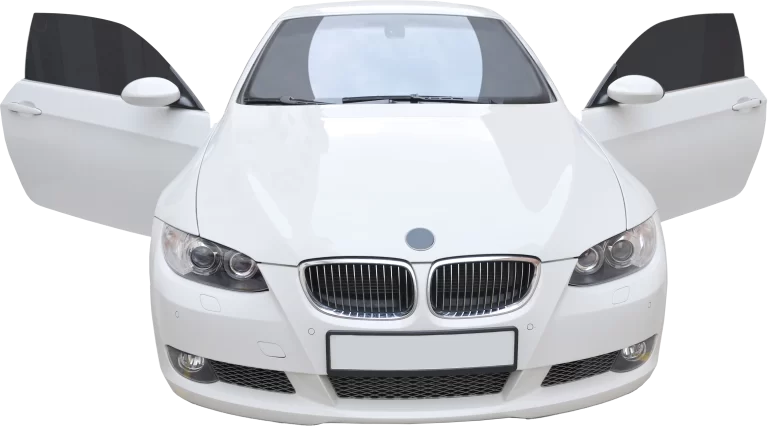 A white BMW 335i with its doors opened.